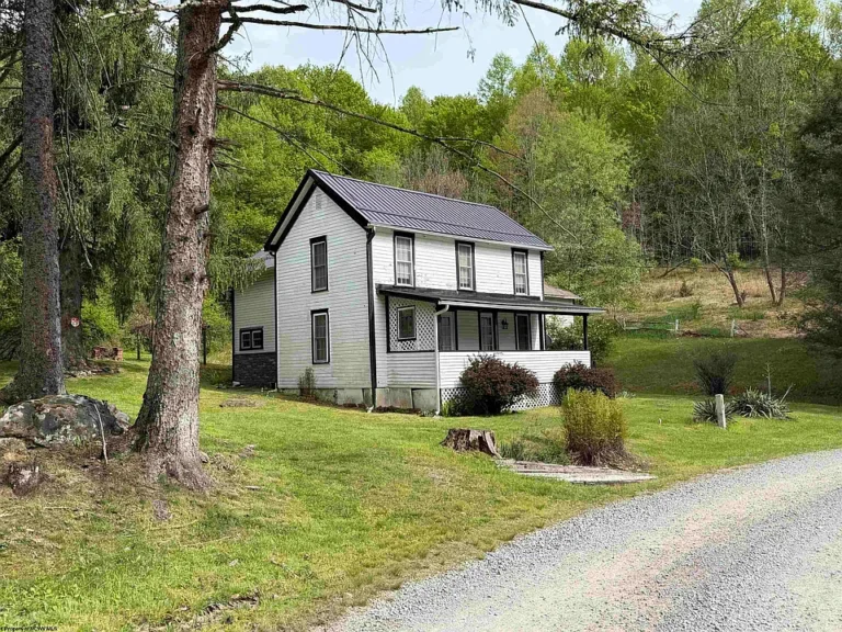 Pretty farmhouse and setting! C. 1895 in French Creek. $239,900.