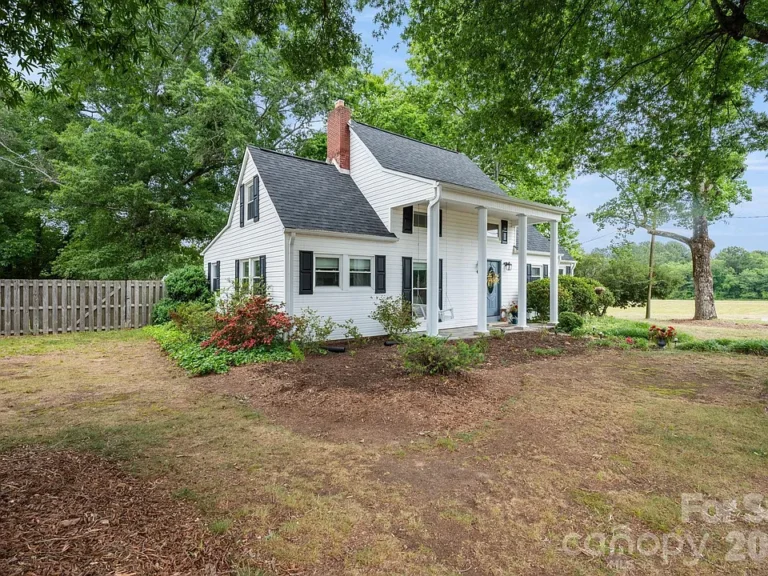 Beautiful front porch and swing! C. 1936 charm in NC. $250,000.