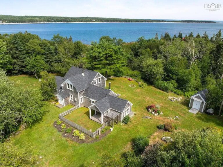 Circa 1900 Farmhouse! On nearly 26 acres and a private beach in Nova Scotia.