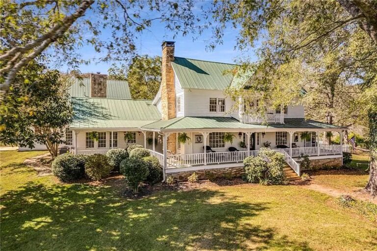 $380,000 cut! On 12 acres! Huge porch! Lots of potential! C. 1830 farmhouse in Georgia.