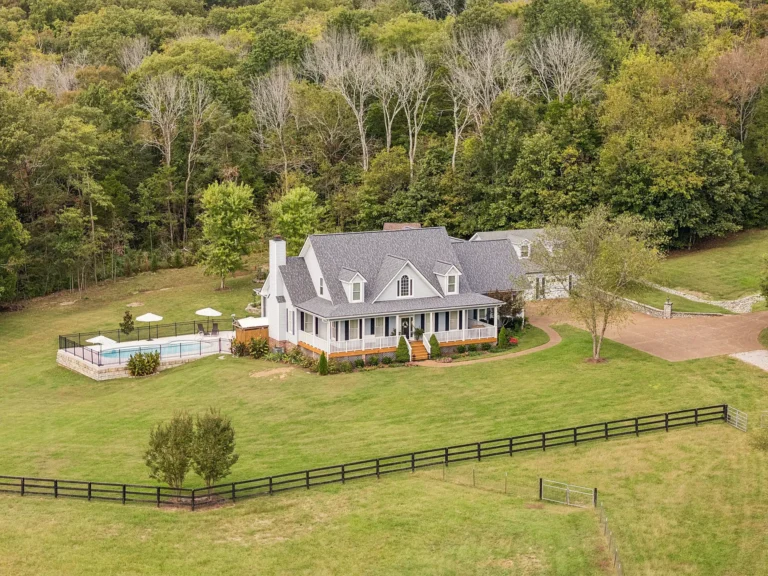 Two houses on 20 acres! Love the long driveway! Pretty pool and setting! $190,000 cut.