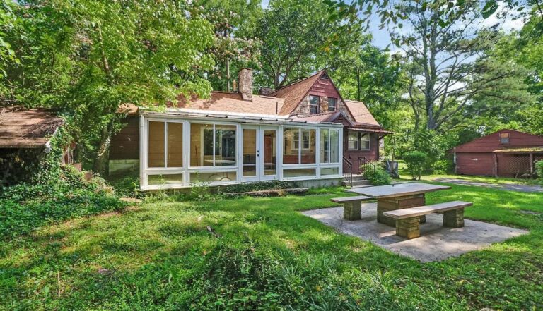 $398,000! Has a guest house and outbuildings! Almost six acres in Tennessee