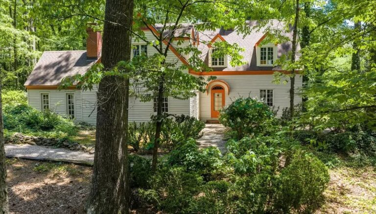 What a beautiful setting! Four fireplaces! Almost three acres in NC for $387,500.