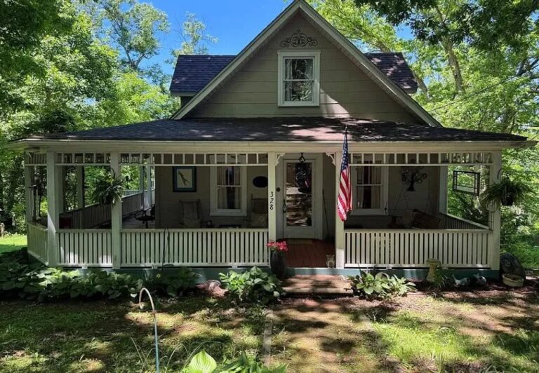$154,900. Full of potential! Porch goals! One acre in West Virginia.