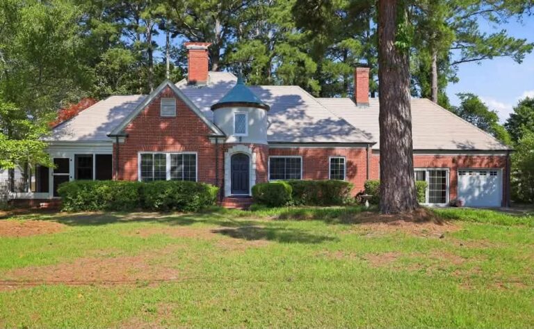 Tudor Revival Ranch with pretty details! Circa 1948 in North Carolina for just $315,000.