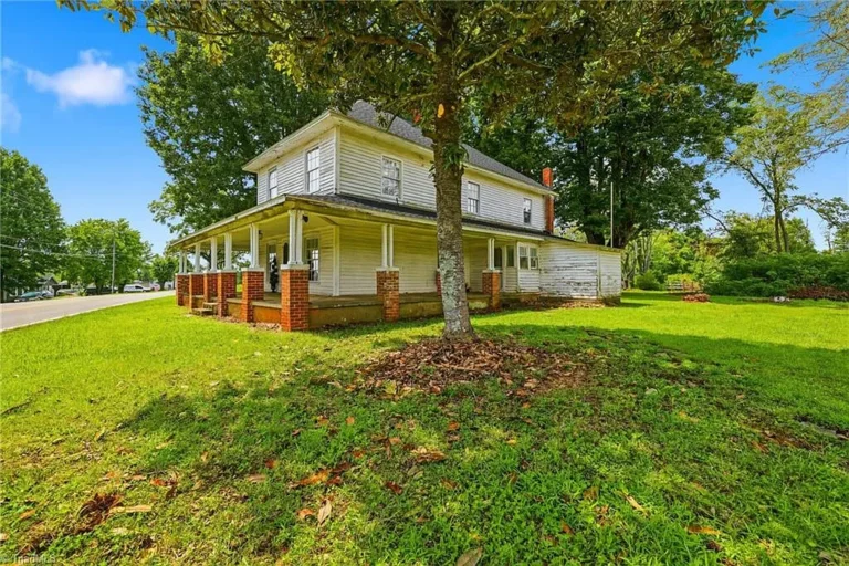 $265,000! Check out that porch! Over thirteen acres! Circa 1864 farmhouse in North Carolina!